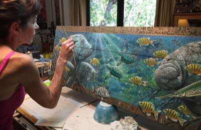 Kathleen Mazzotta paints Manatee Family in the Mangroves
