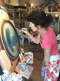 Kathleen Onda Mazzotta Airbrushes a Manatee Clock
